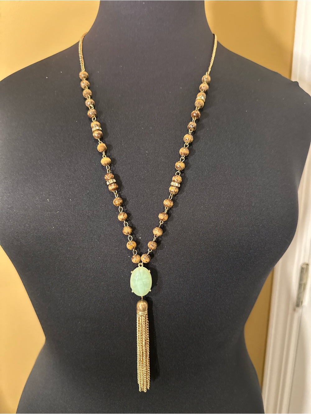Gold-Tone Beaded Necklace with Mint Green Pendant Tassel